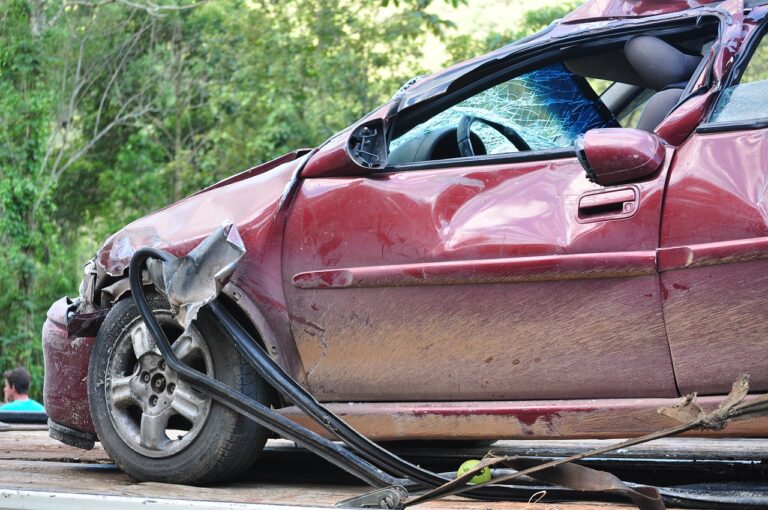 Severely damaged car after a collision, showcasing the impact of a serious vehicle accident and demonstrating a situation where a San Diego Car Accident Attorney can be very helpful.