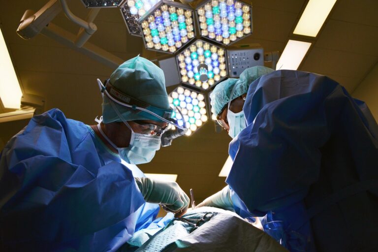 Team of surgeons performing an operation, representing the high-stakes environment where medical malpractice can occur